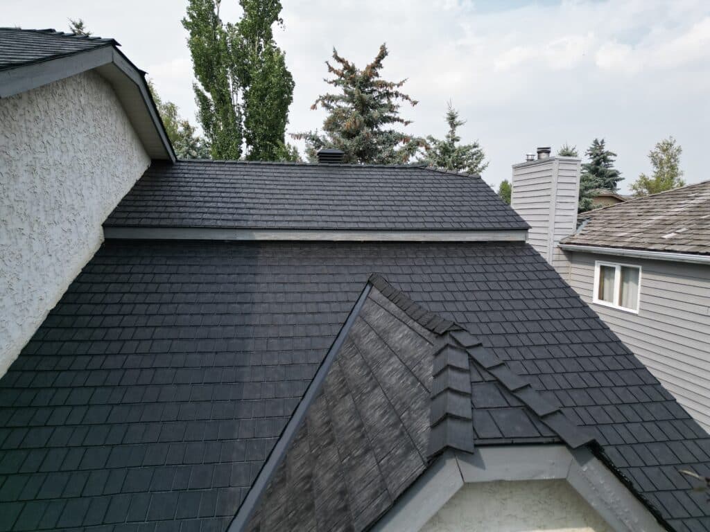 A view of a roof with rubber shingles